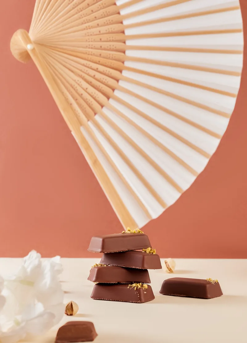 Bouchées de chocolat au lait parsemées de pistache